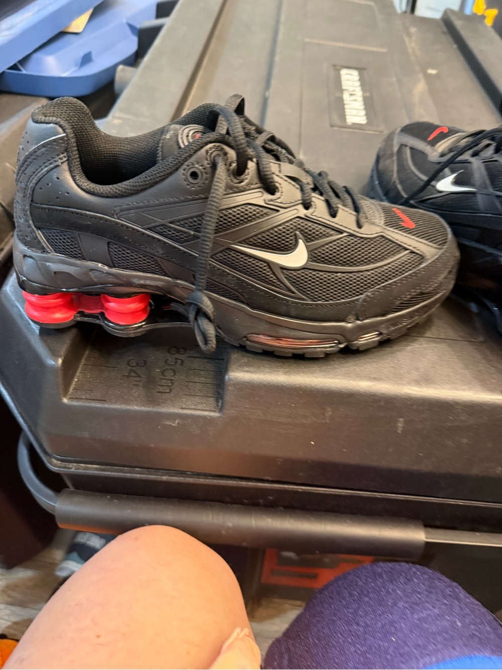 Nike Kids Black Sneakers with Red Accents